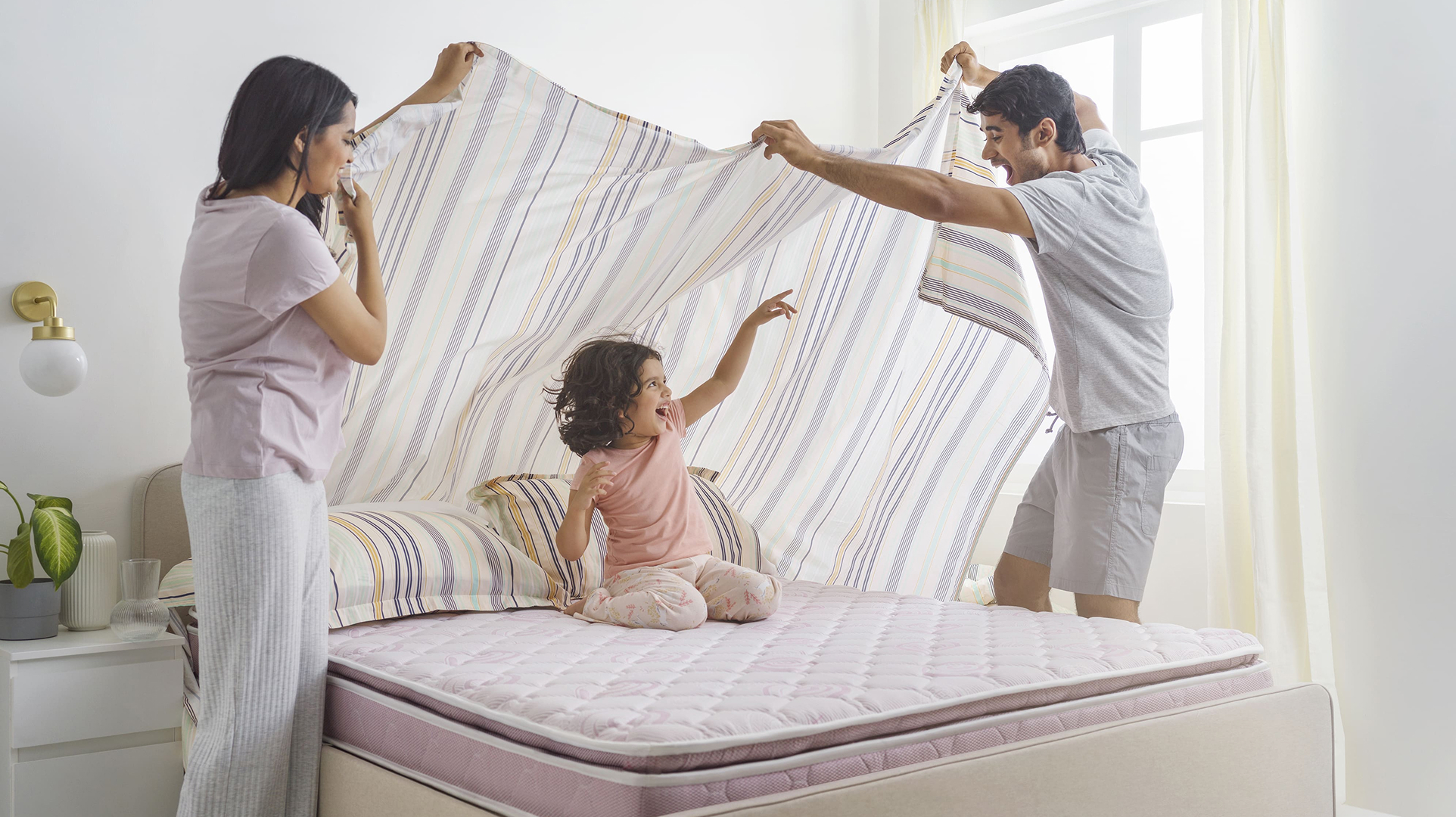 Happy Family on Bed